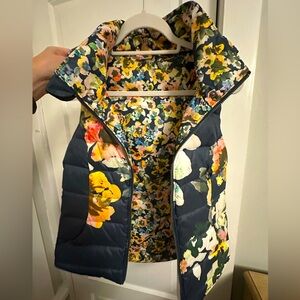 Floral puffer vest. Anthropologie